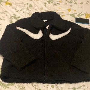 Nike sports wear swoosh L